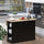 Freestanding Kitchen Island Cabinet, Wooden Kitchen Island Table with Drop Leaf, Fluted-Style Storage Cabinet with Adjustable Shelves, Black