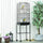 62" Metal Indoor Bird Cage Starter Kit With Detachable Rolling Stand, Storage Basket, And Accessories, Black